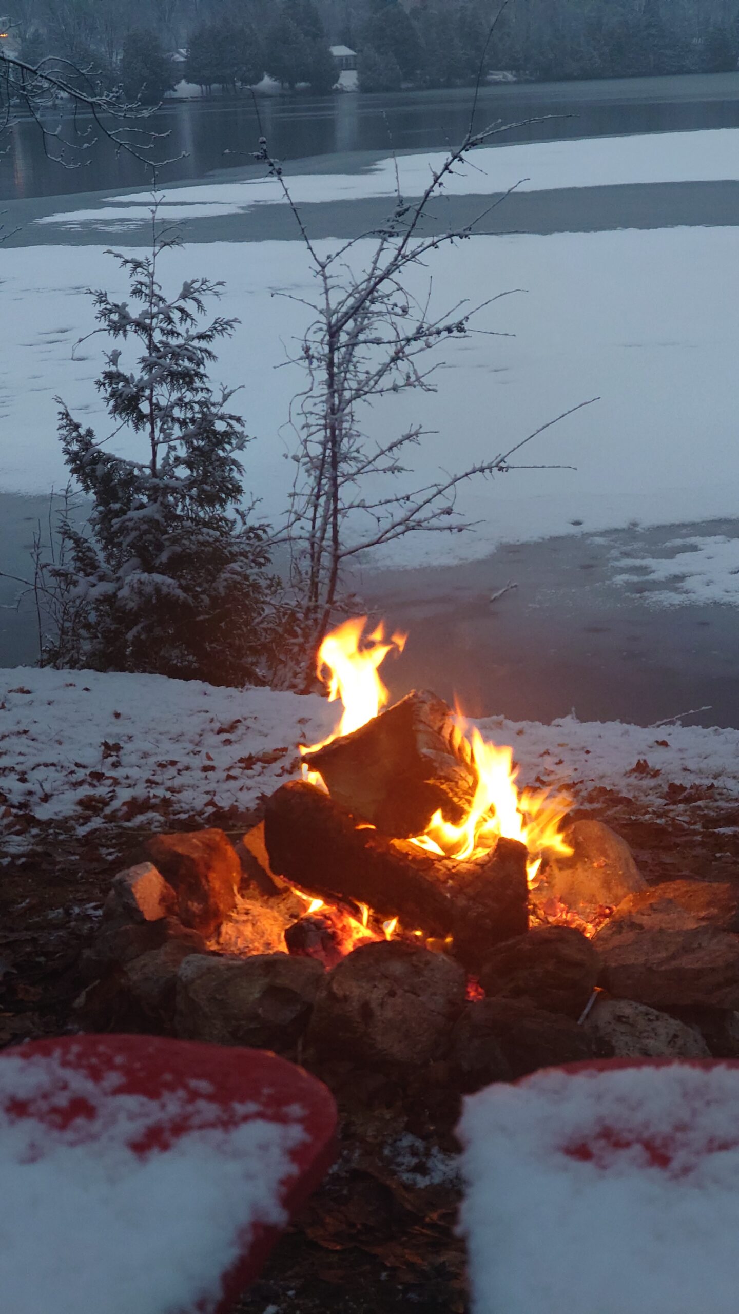 Outdoor Fire in Winter - Blue Oasis Lakefront Cottage