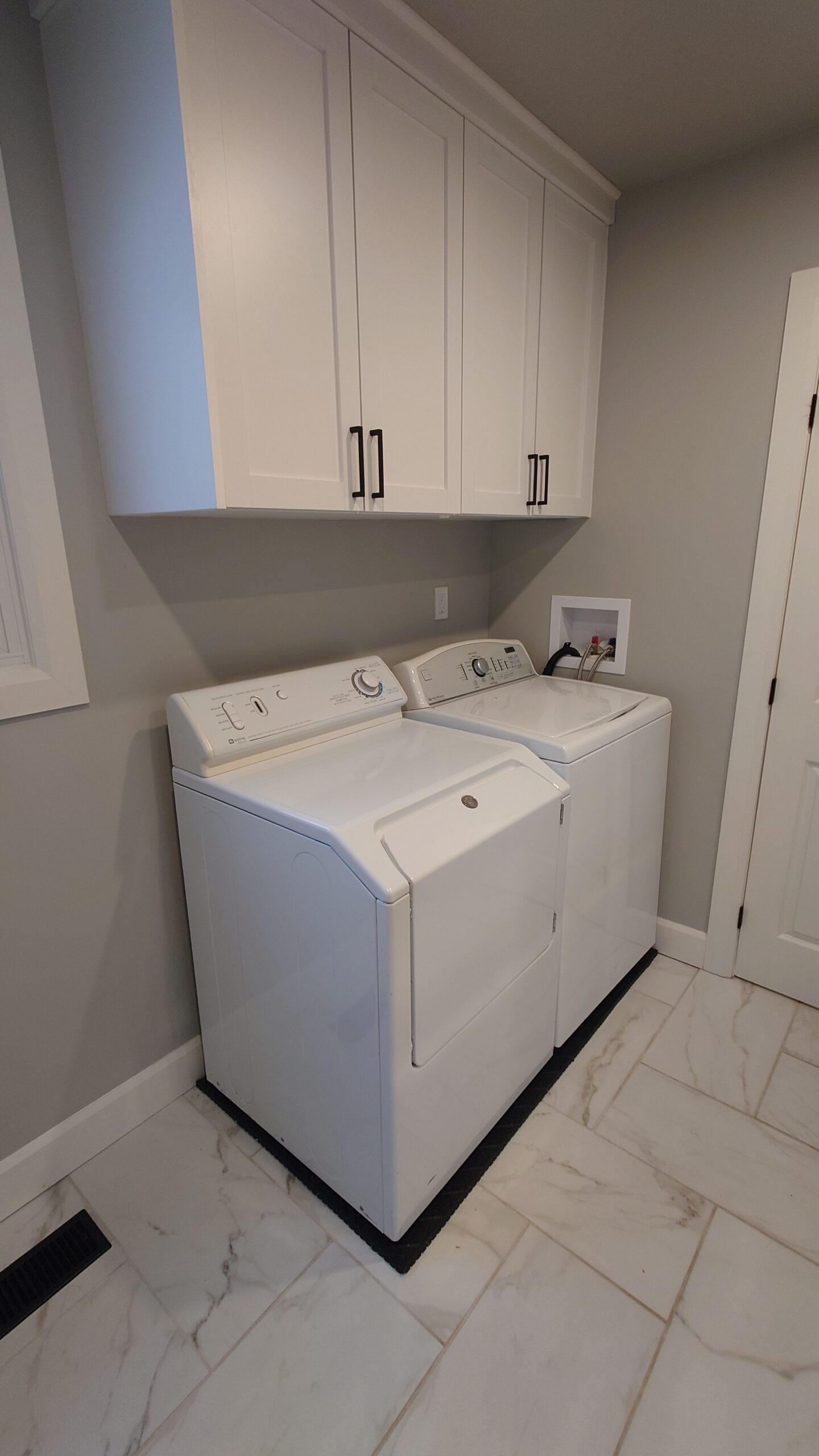 Washer and Dryer at Blue Oasis Lakefront Cottage